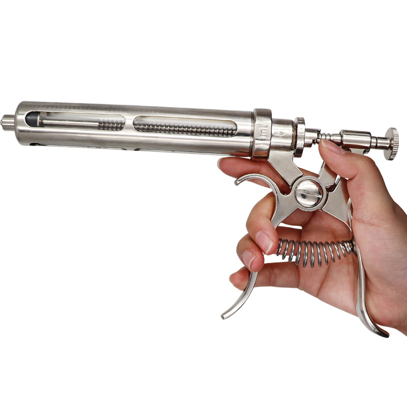 ปืนฉีดรีโวลเวอร์แบบต่อเนื่องทำ - Veterinary Syringe Gun บทวิจารณ์และราคา